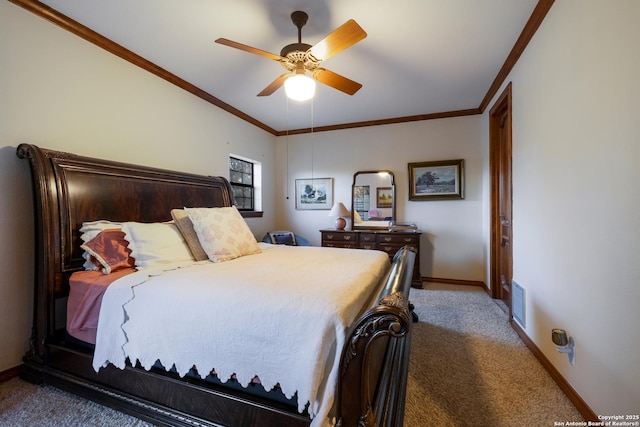 carpeted bedroom featuring ceiling fan and ornamental molding