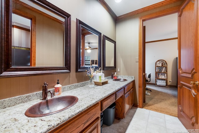 bathroom with vanity, crown molding, and tile patterned floors