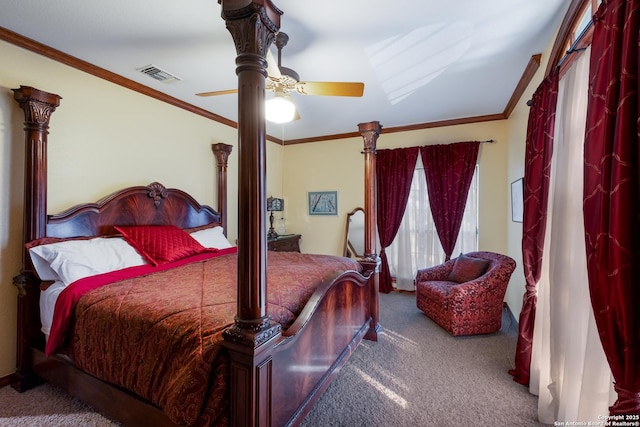 bedroom featuring crown molding, ceiling fan, and carpet