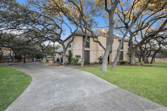 view of property exterior featuring a yard