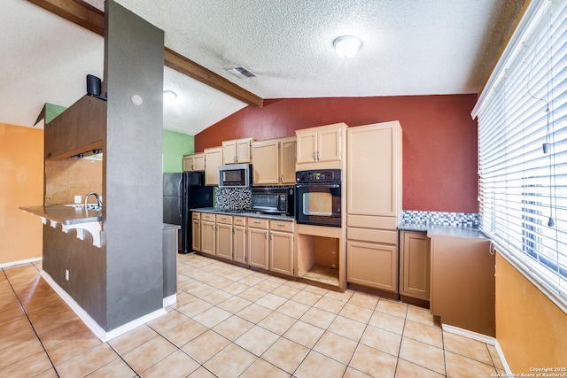 kitchen with lofted ceiling with beams, decorative backsplash, light tile patterned floors, black appliances, and a textured ceiling