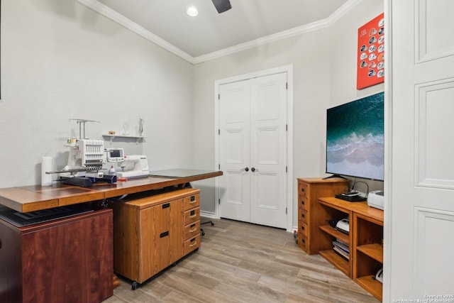 office with crown molding, ceiling fan, and light hardwood / wood-style flooring