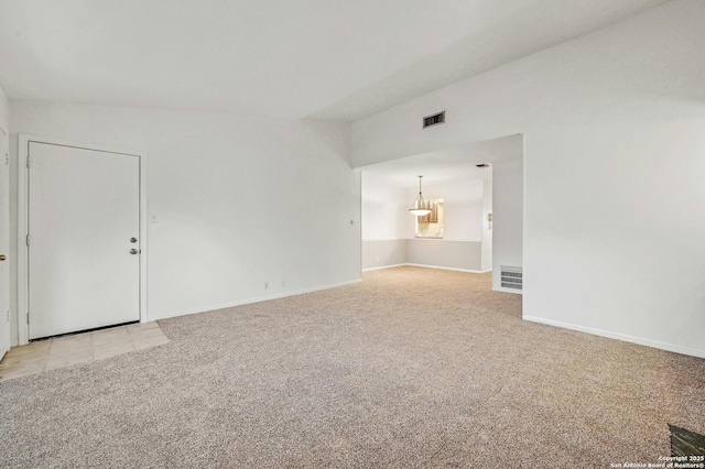 unfurnished room with light carpet