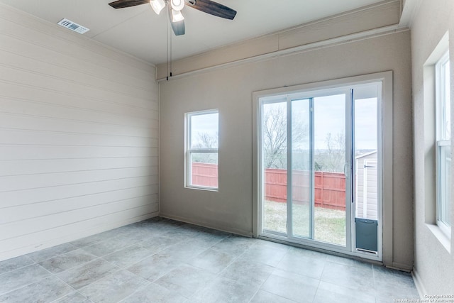 empty room featuring ceiling fan