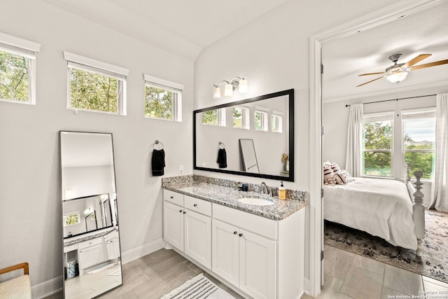 bathroom featuring vanity and ceiling fan