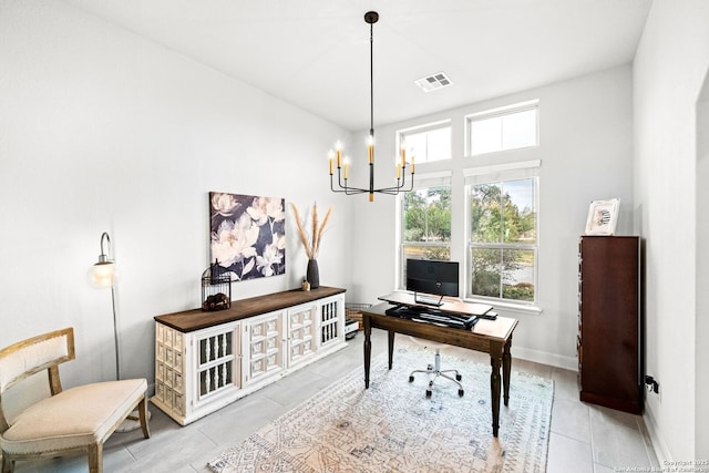 tiled office with a chandelier