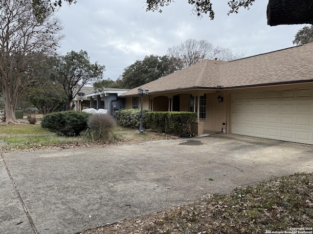 single story home with a garage