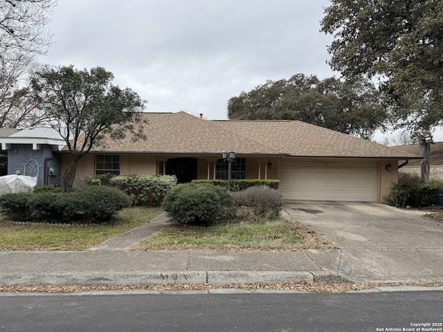 single story home featuring a garage