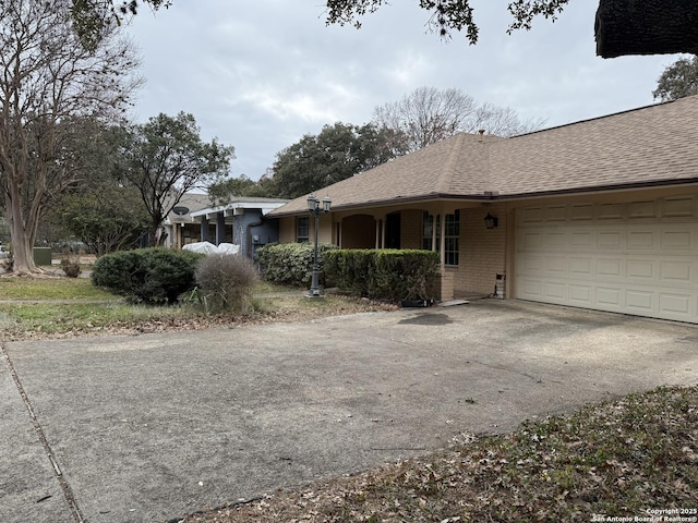 ranch-style home with a garage