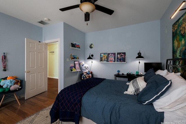 bedroom featuring ceiling fan and wood-type flooring