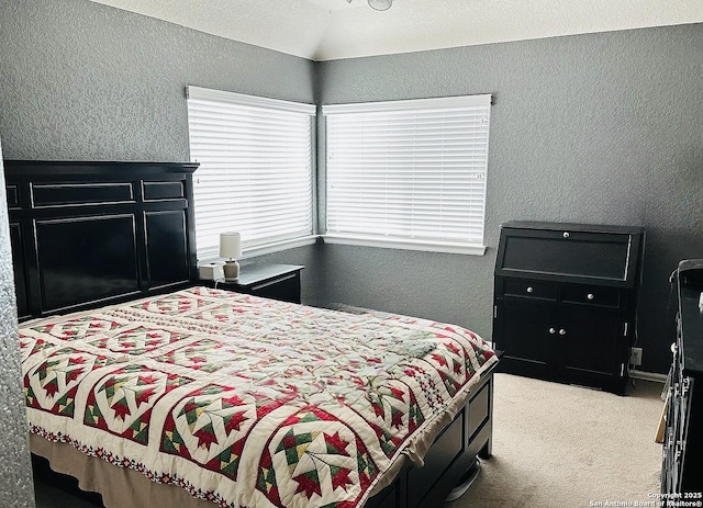 bedroom with light carpet