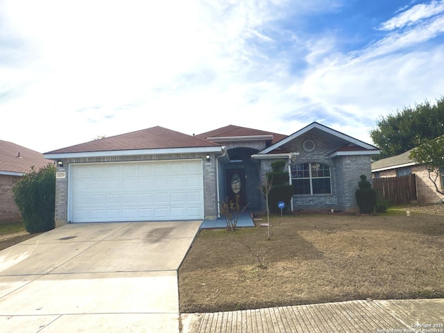 single story home featuring a garage