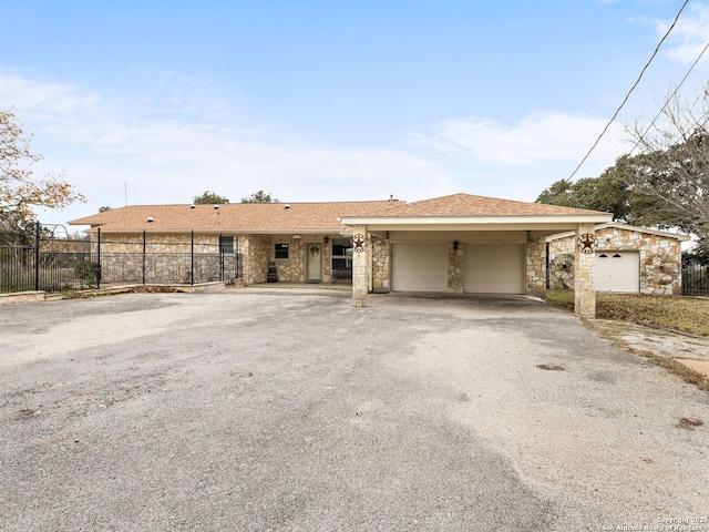 single story home with a garage