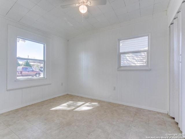 empty room with ceiling fan