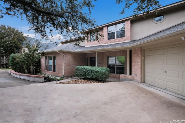 view of front of property featuring a garage