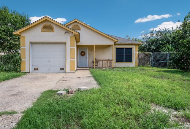 ranch-style house with a garage and a front yard