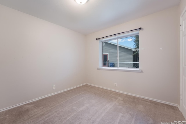 view of carpeted spare room