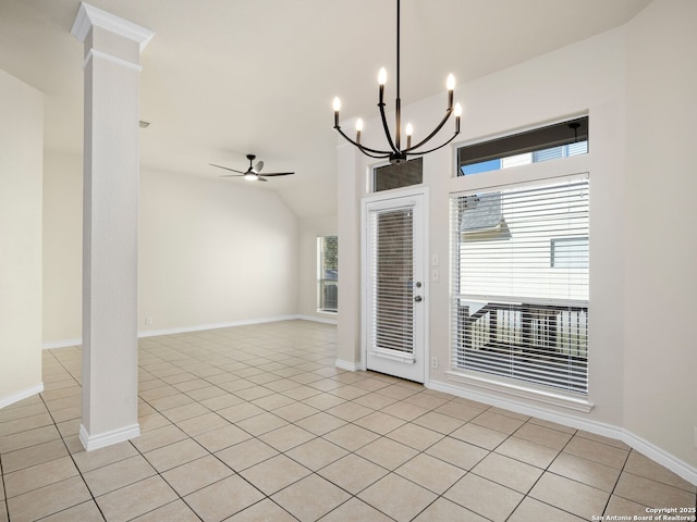 unfurnished dining area featuring vaulted ceiling, ceiling fan with notable chandelier, a healthy amount of sunlight, and light tile patterned floors