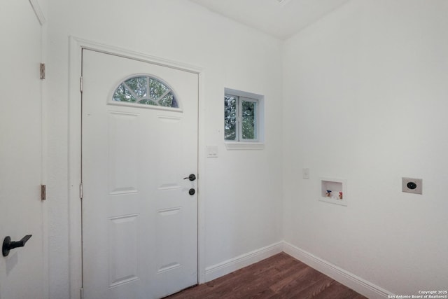 washroom featuring washer hookup, dark hardwood / wood-style flooring, and hookup for an electric dryer