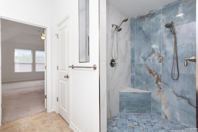 bathroom with tiled shower, tile patterned floors, and ceiling fan