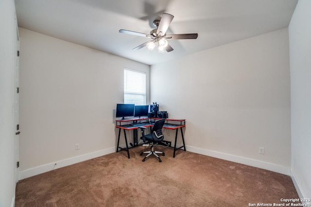 office space with carpet floors and ceiling fan