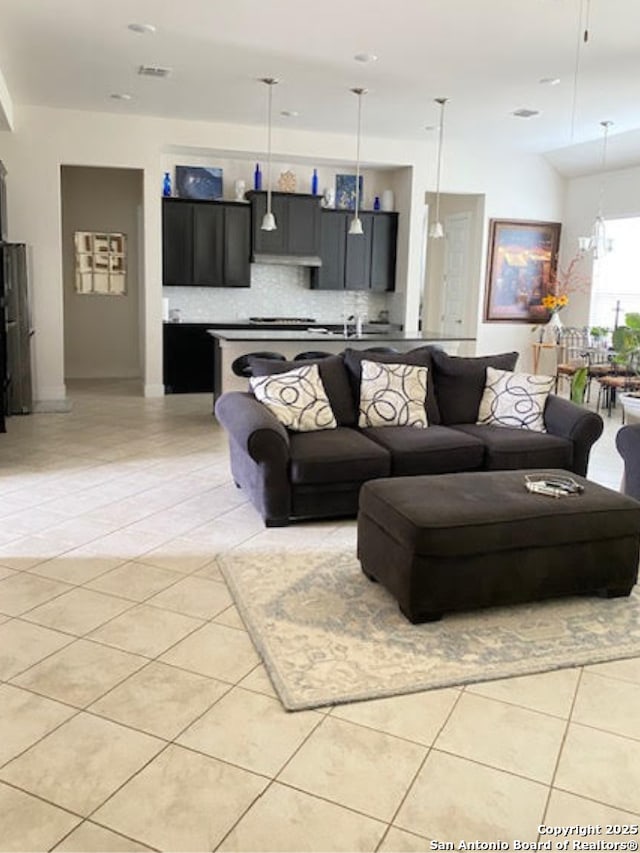 living room featuring light tile patterned floors