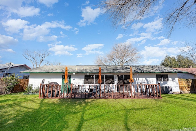 back of property featuring a playground and a lawn