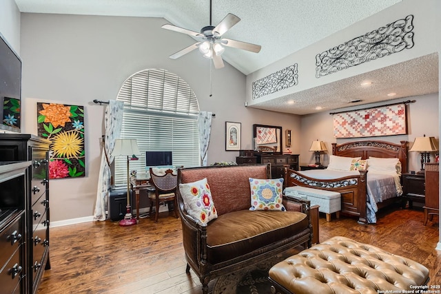 bedroom featuring dark hardwood / wood-style floors, high vaulted ceiling, and a textured ceiling