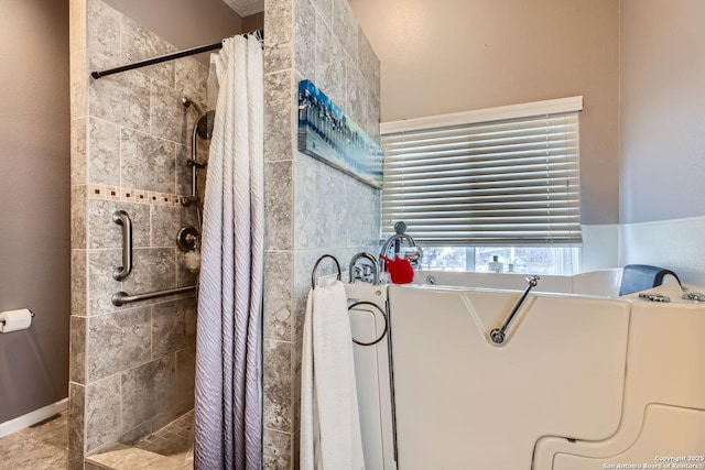 bathroom featuring curtained shower