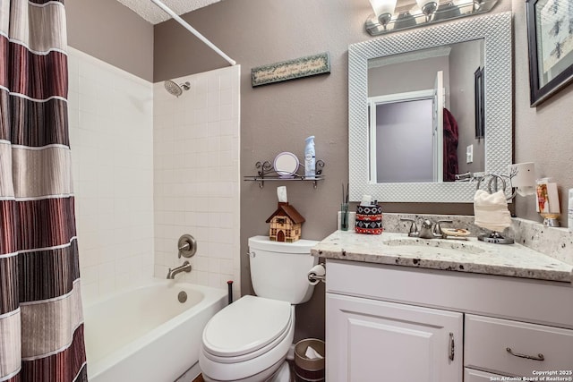 full bathroom with shower / tub combo, vanity, and toilet