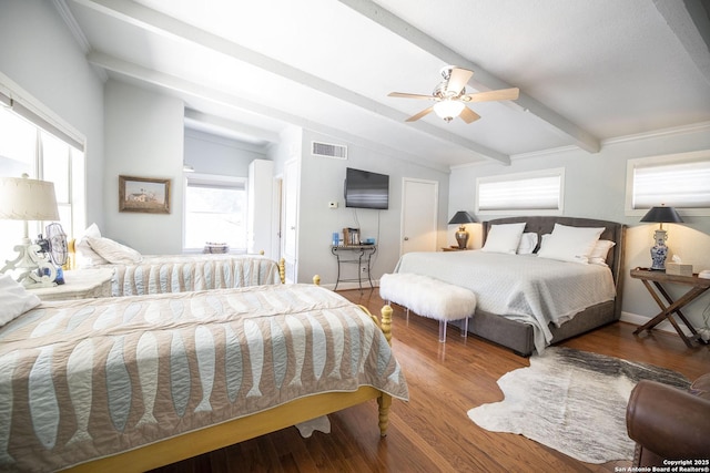 bedroom with vaulted ceiling with beams, wood-type flooring, and ceiling fan