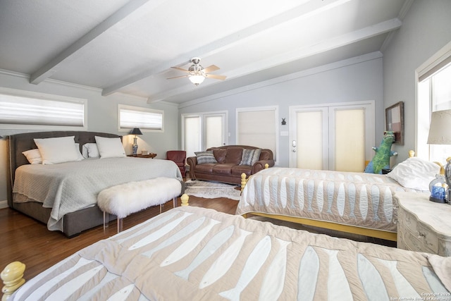 bedroom featuring ceiling fan, dark hardwood / wood-style flooring, and lofted ceiling with beams