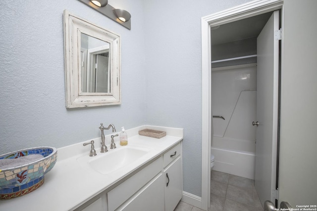 full bathroom with vanity, tile patterned floors, shower / bathtub combination, and toilet