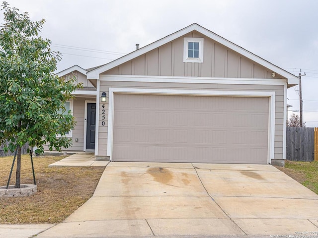 single story home featuring a garage