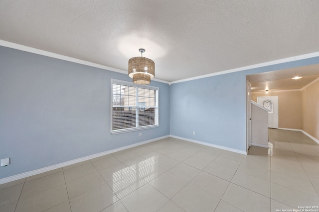 unfurnished room featuring crown molding, light tile patterned flooring, and a textured ceiling