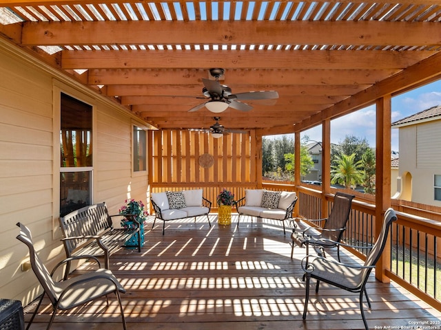 exterior space featuring a wooden deck, ceiling fan, and an outdoor living space