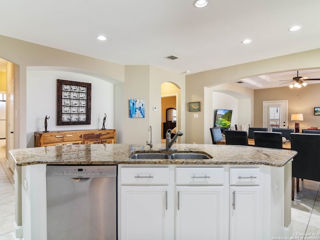 kitchen featuring white cabinetry, sink, dishwasher, and a center island with sink