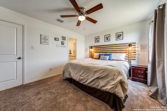 carpeted bedroom with ceiling fan and connected bathroom