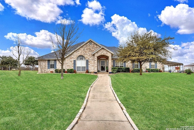 single story home with a front yard