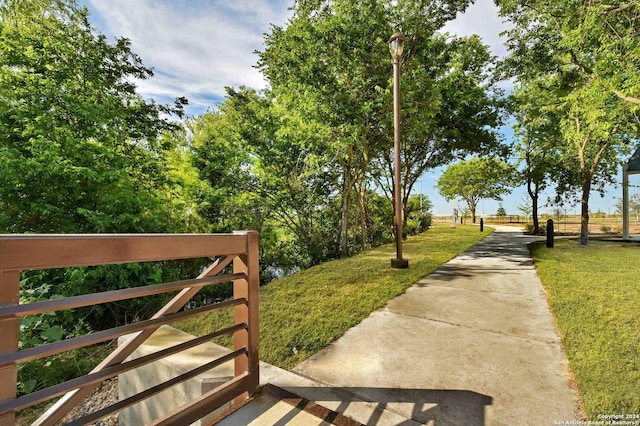 view of community featuring a yard