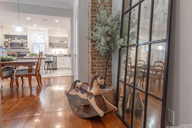 interior space with hardwood / wood-style floors