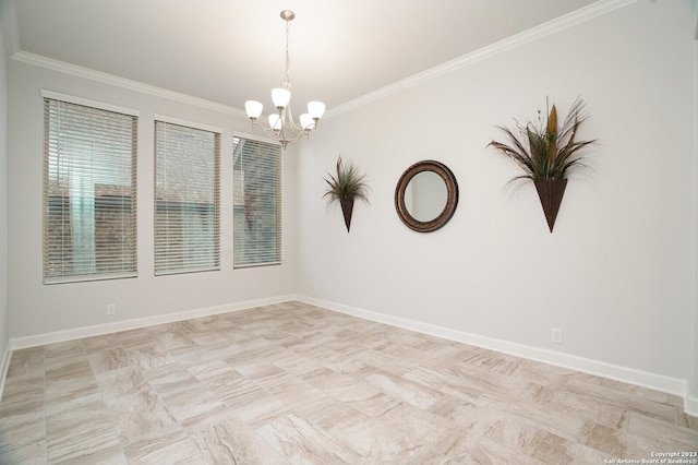 spare room with crown molding and an inviting chandelier