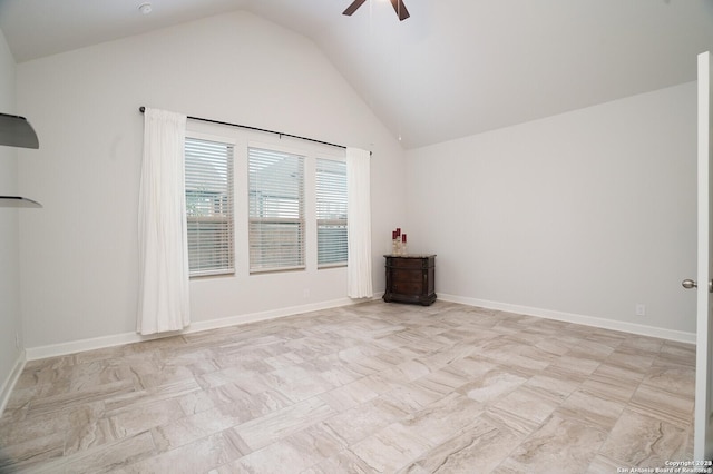 unfurnished room featuring ceiling fan and lofted ceiling