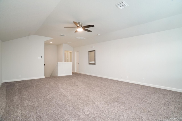 interior space featuring carpet, lofted ceiling, and ceiling fan