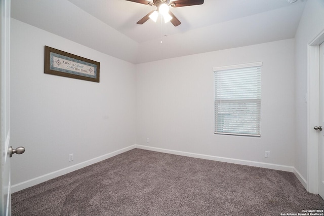 unfurnished room featuring ceiling fan and carpet floors