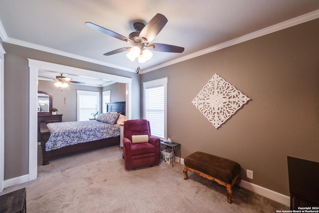 bedroom with light carpet, ornamental molding, and ceiling fan