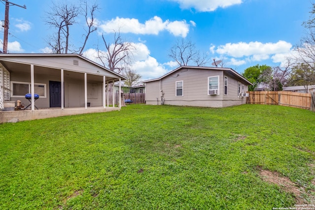 view of yard featuring cooling unit and a patio area