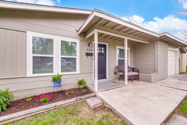 property entrance with a garage