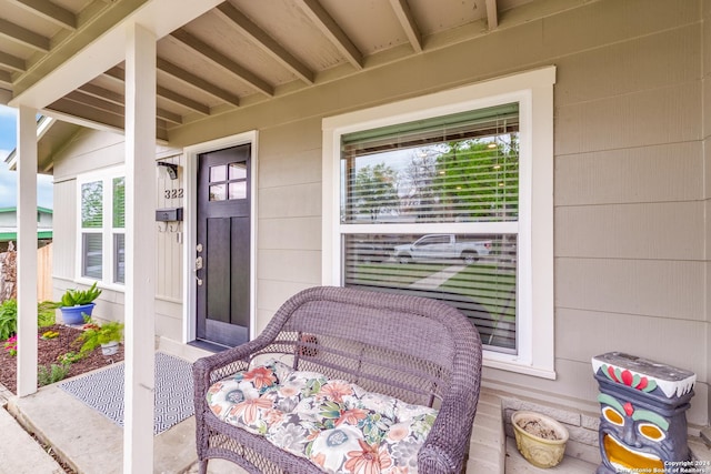 doorway to property with a porch