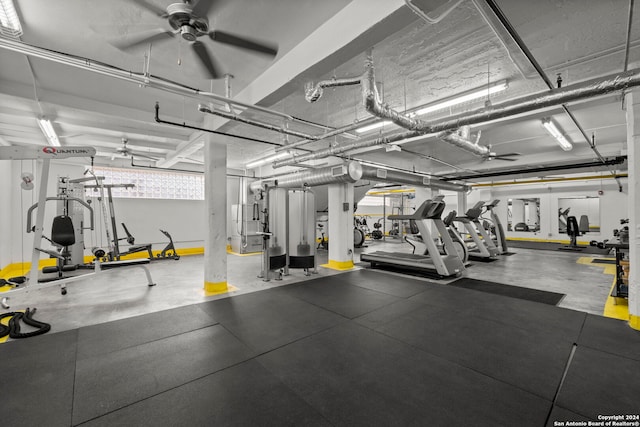 exercise room with ceiling fan